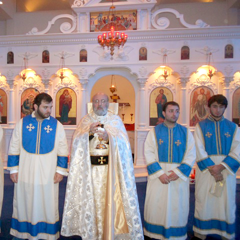 Rev. Fr. Tateos Abdalian with altar servers